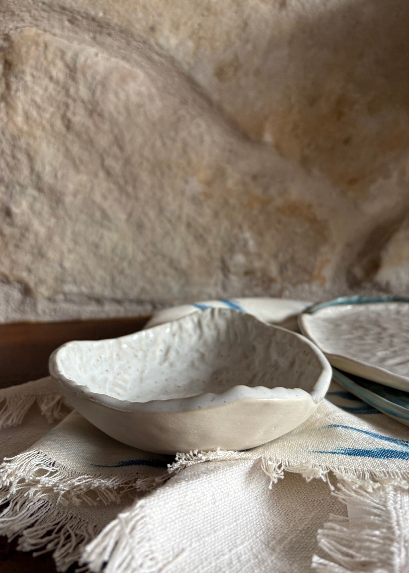 The Mar Collection | Side view of Pyrite White Pebble Dash Serving Bowls | Tor Pottery