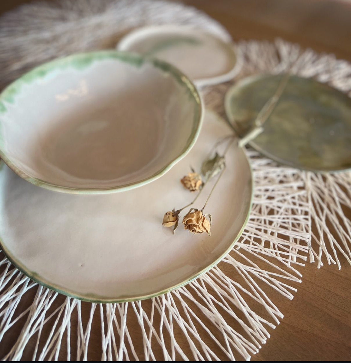 The Halo Collection | Opal White with Green Edging Dining Plates and Bowls Side view | Tor Pottery