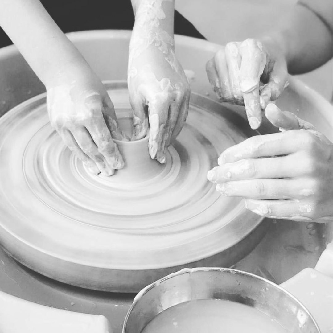 Workshops | Image of Hands on Pottery Wheel During Workshops | Tor Pottery 